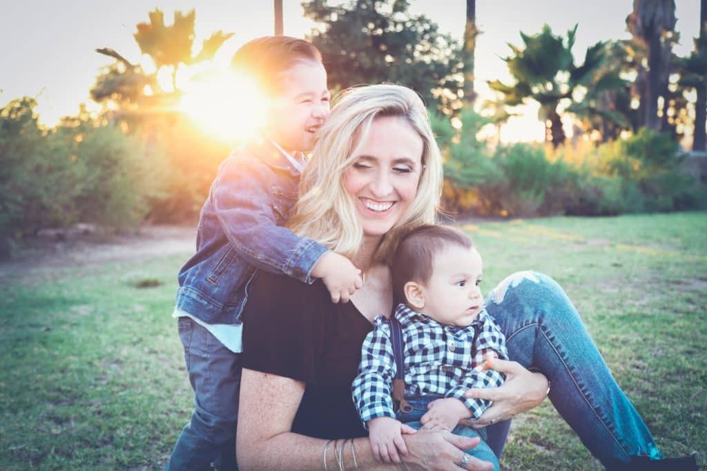 mother and sons smiling healthy living